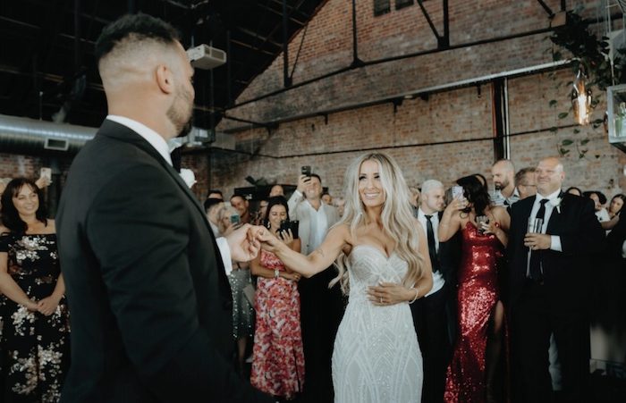 wedding ceremony couple and crowd on the mezzanine level at 1915 geelong